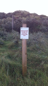 high tide sign